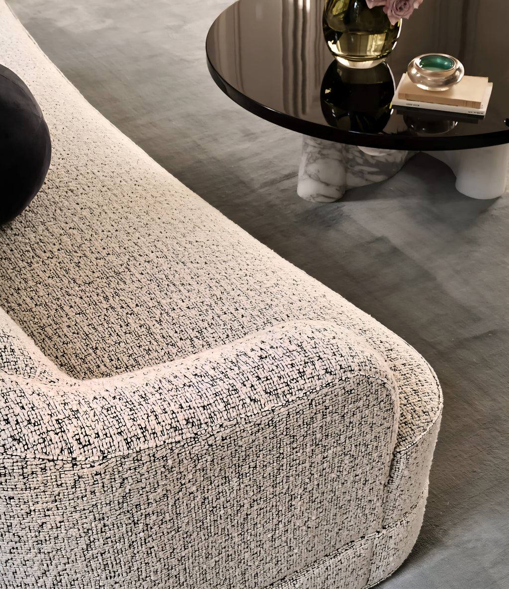 THE ONE × Mylene — Black and White Boucle Curved Sofa by goop