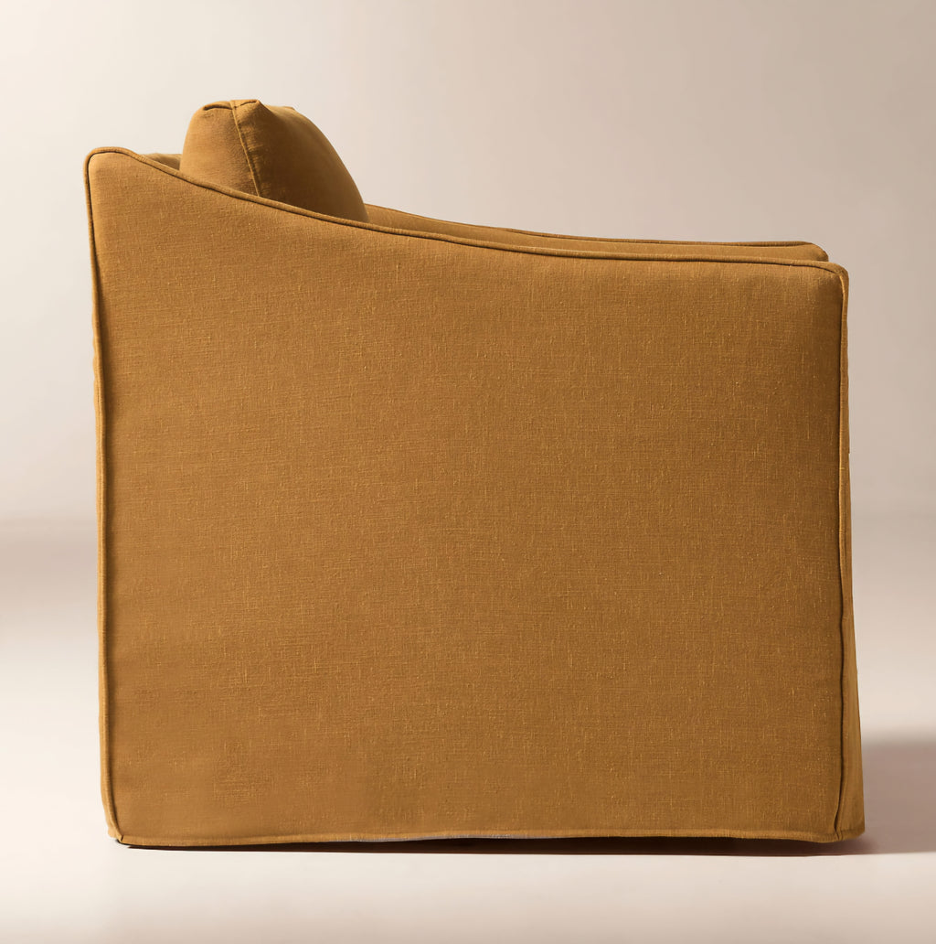THE ONE × Bristol — Cognac Slipcovered Performance Linen Swivel Chair