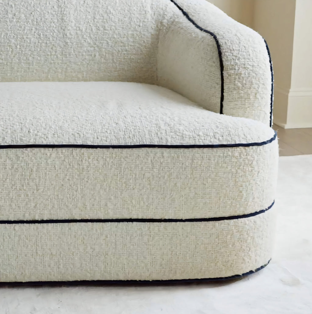 THE ONE × Mylene — Black and White Boucle Curved Sofa