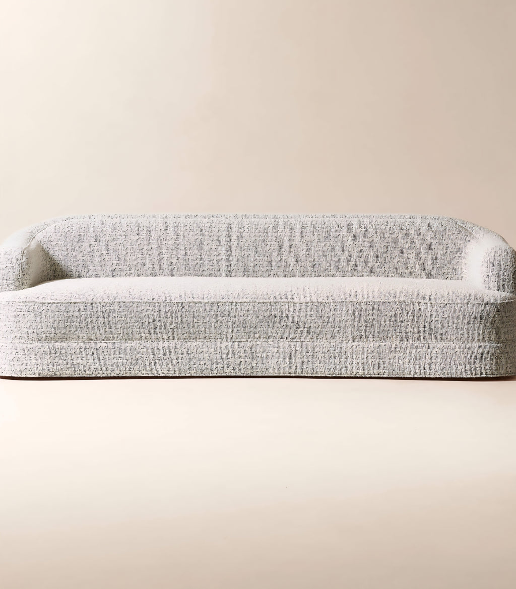 THE ONE × Mylene — Black and White Boucle Curved Sofa by goop