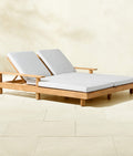 THE ONE × Pinet — Teak Outdoor Double Chaise Lounge with Warm Light Grey Sunbrella® Cushions