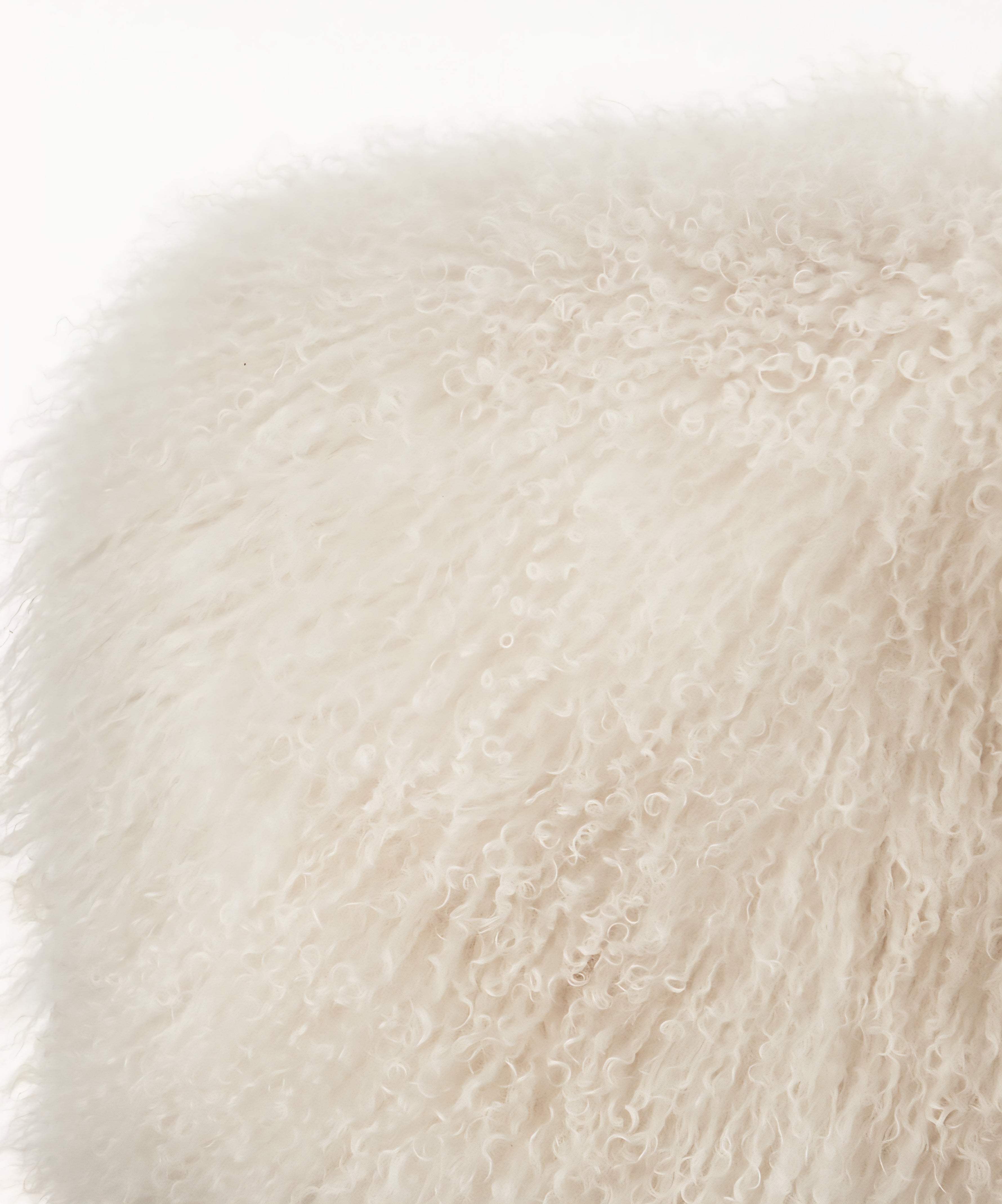 THE ONE × Mongolian Sheepskin Ottoman