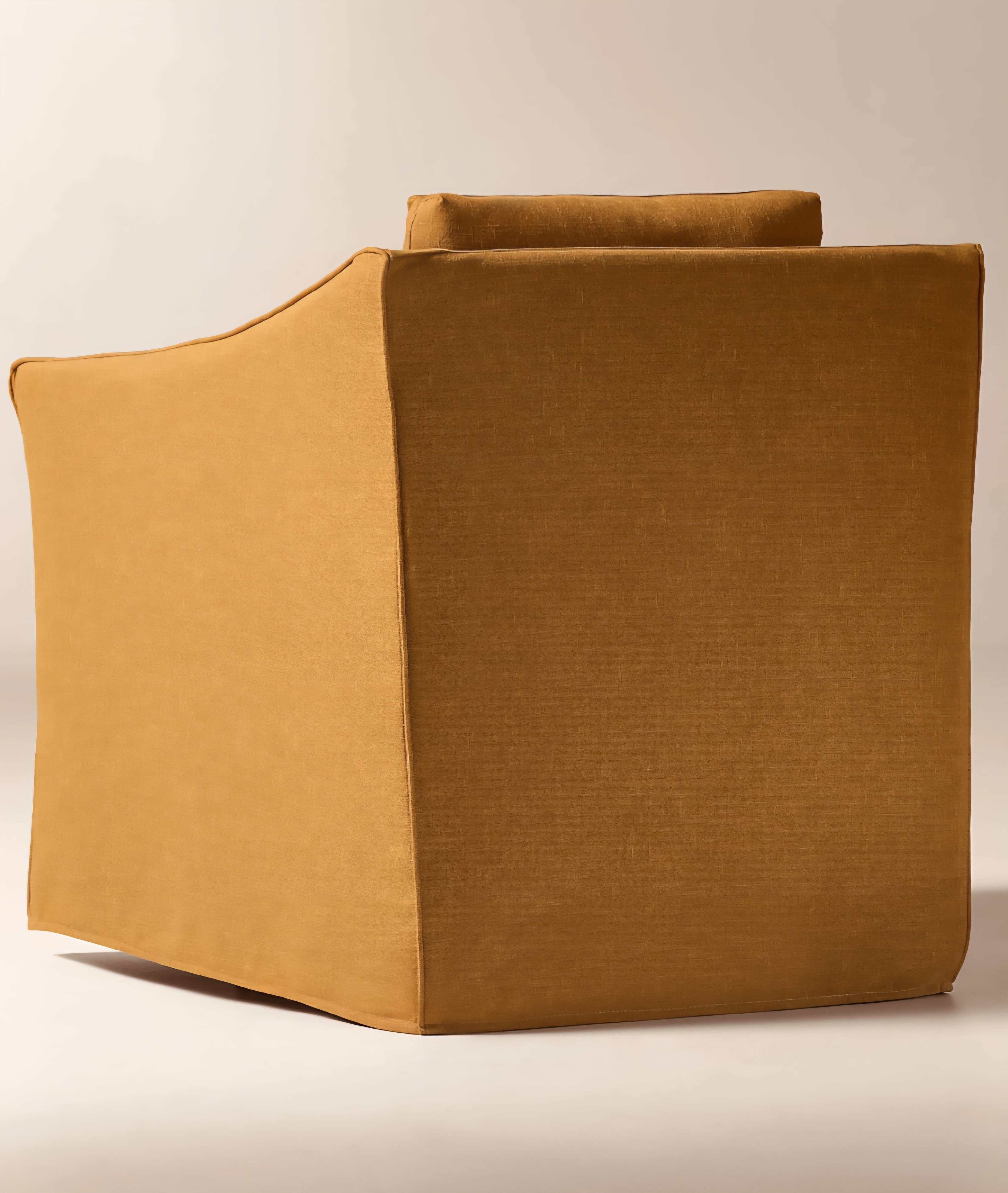 THE ONE × Bristol — Cognac Slipcovered Performance Linen Swivel Chair
