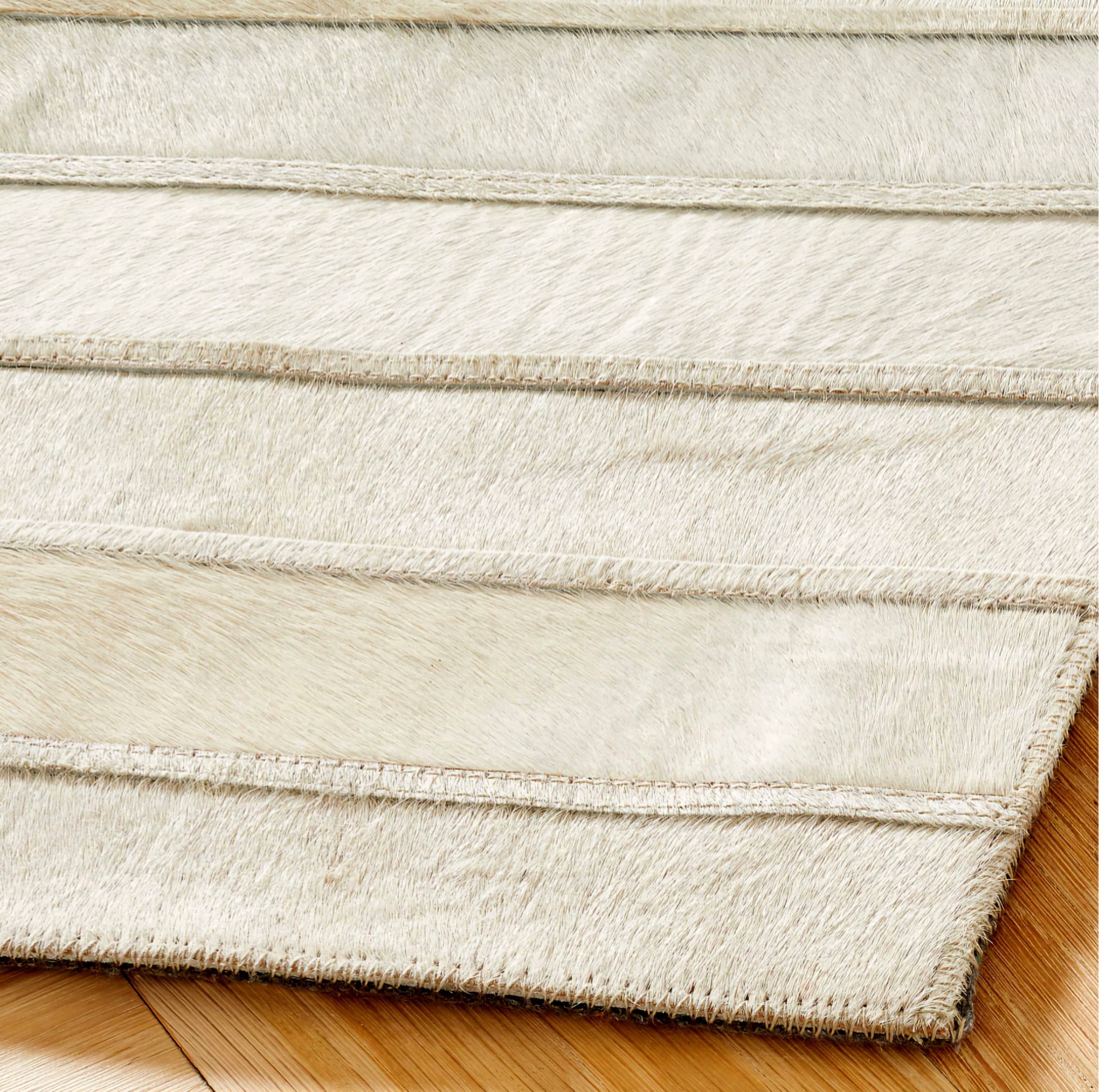 THE ONE × Camilia — Patchwork Ivory Hide Area Rug