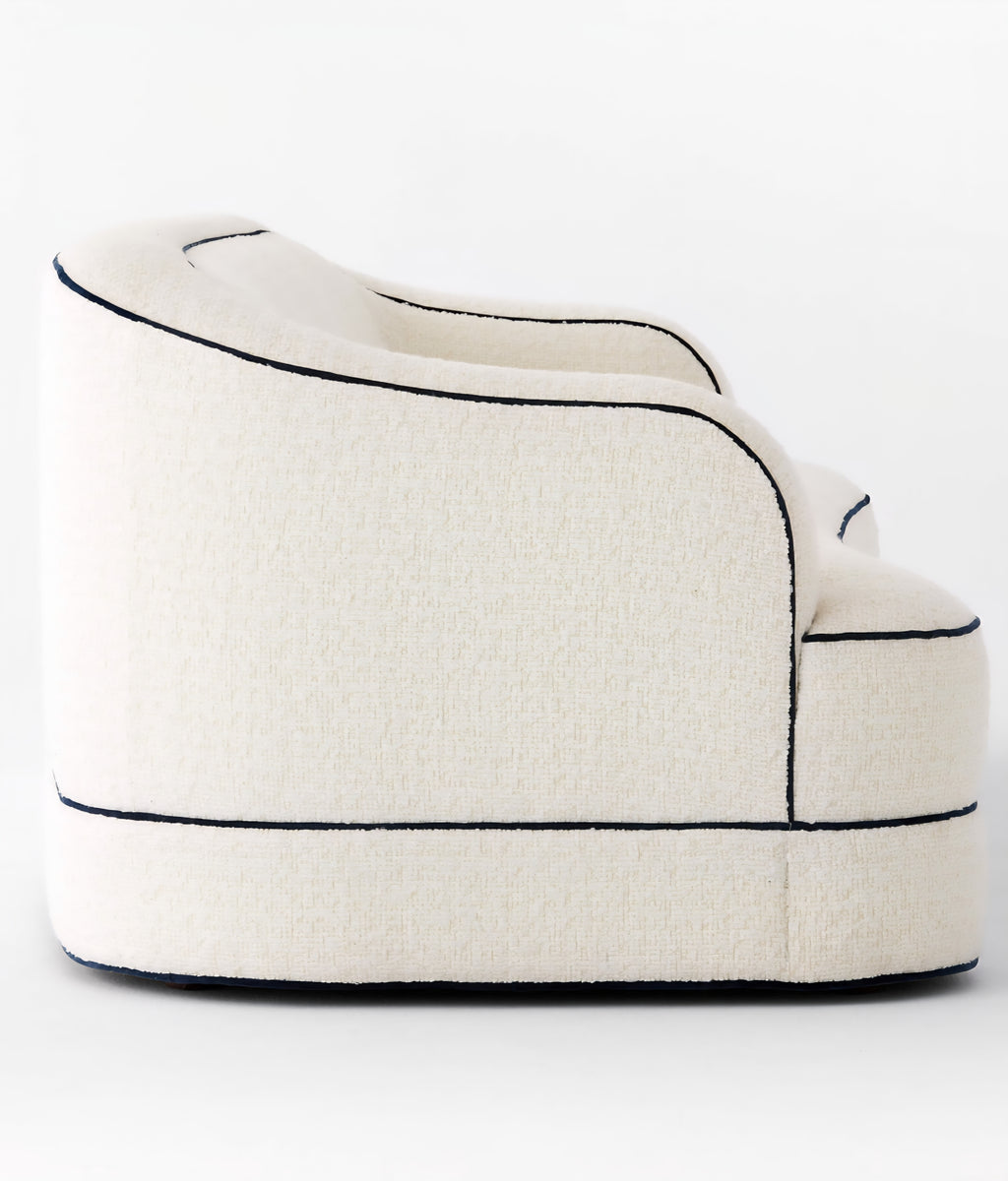 THE ONE × Mylene — Black and White Boucle Curved Sofa by goop