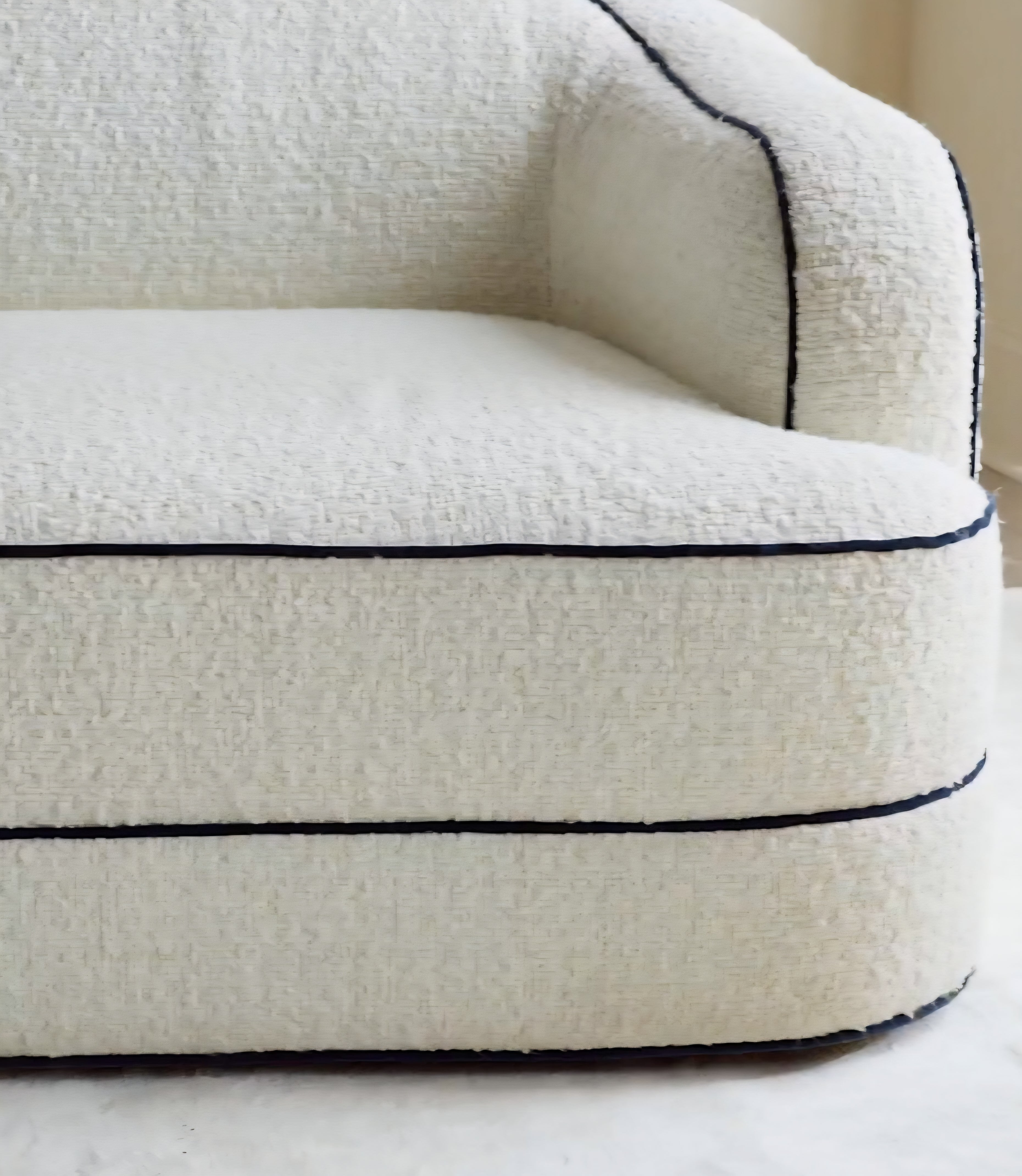 THE ONE × Mylene — Black and White Boucle Curved Sofa by goop