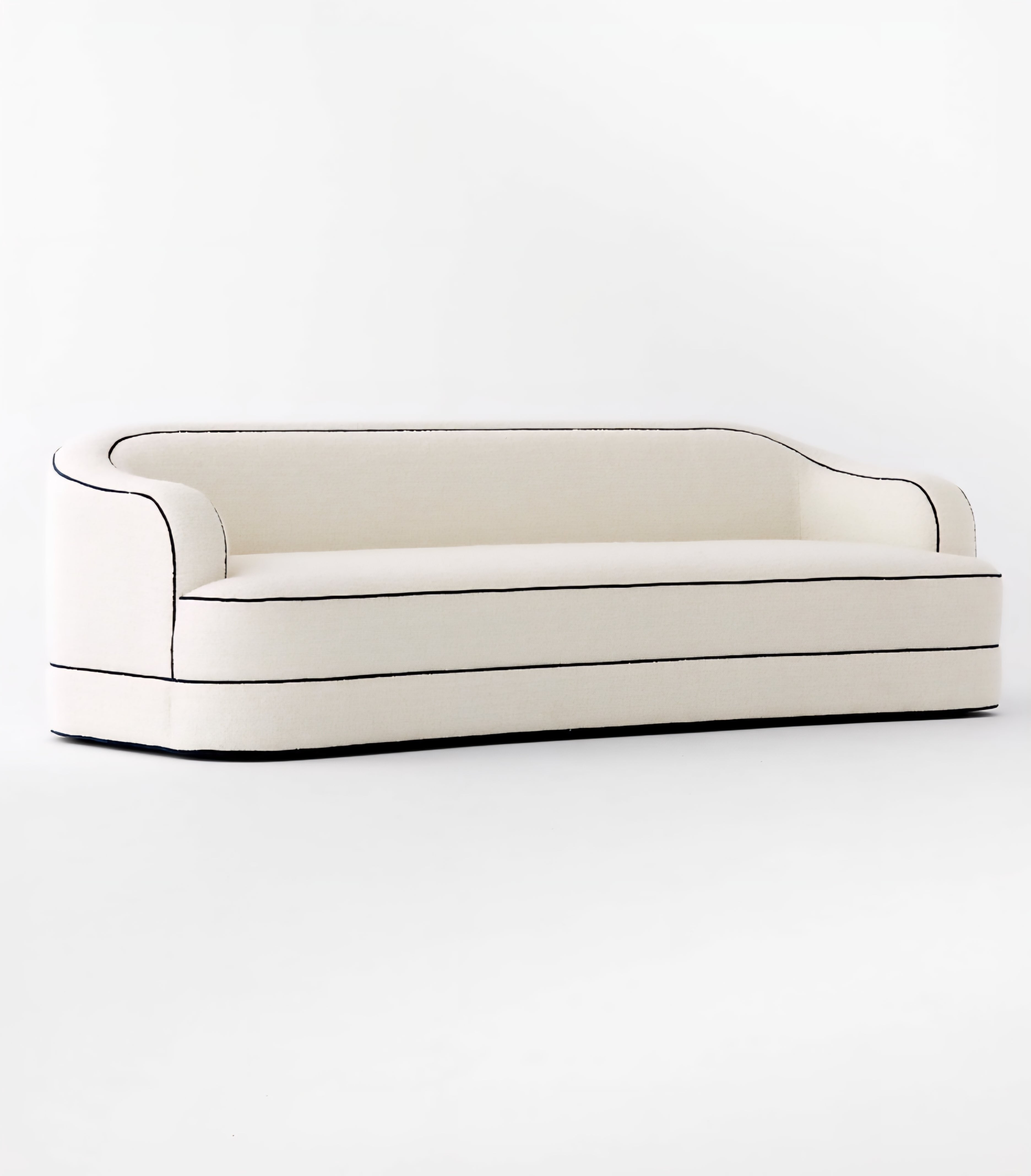 THE ONE × Mylene — Black and White Boucle Curved Sofa by goop