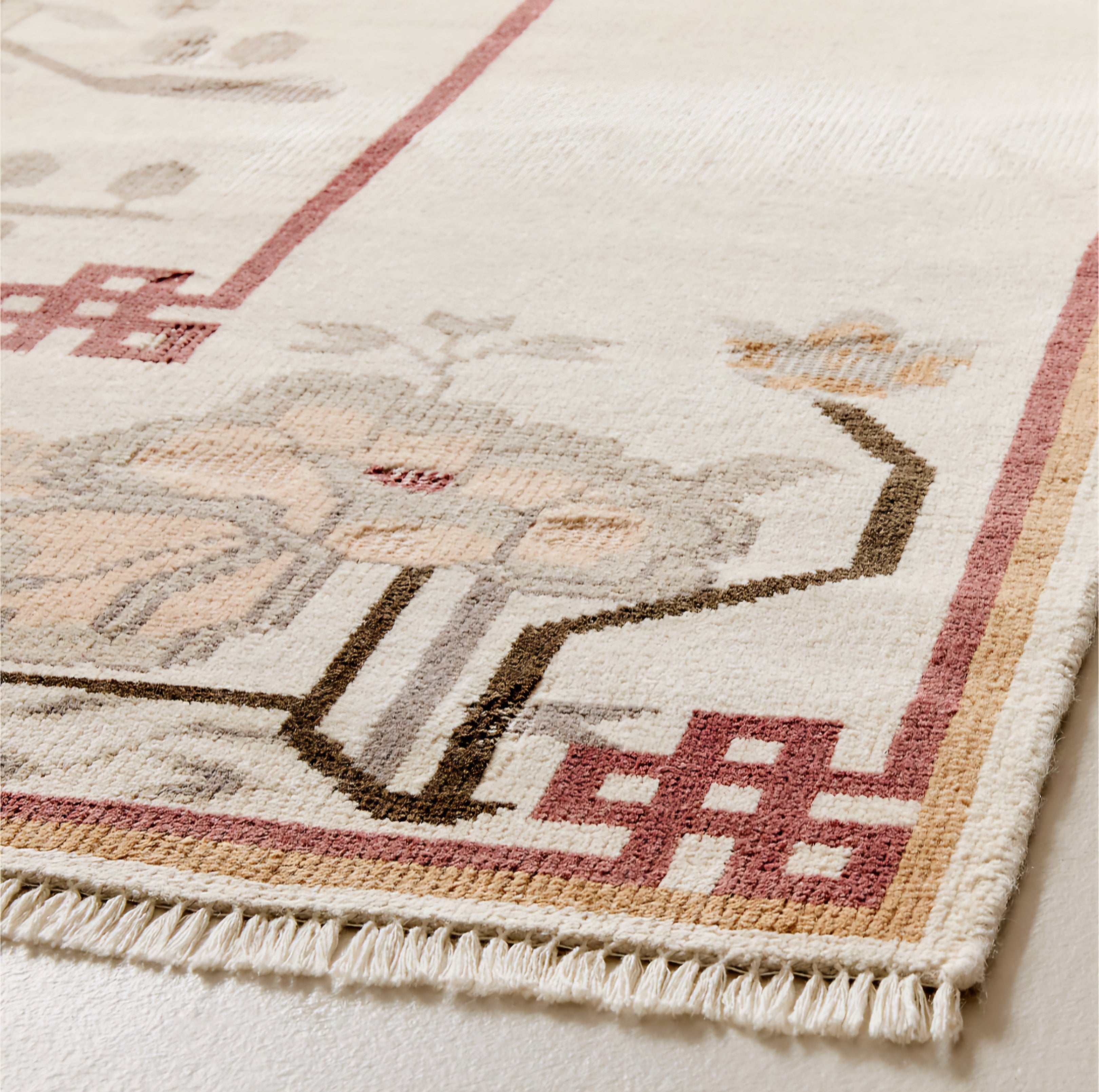 THE ONE × Fiora — Hand-Knotted Distressed Warm White New Zealand Wool Area Rug