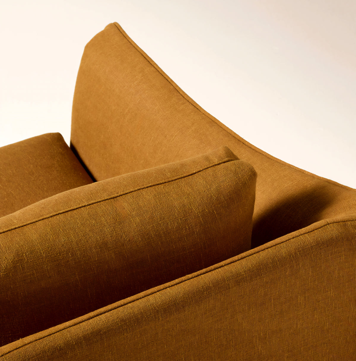 THE ONE × Bristol — Cognac Slipcovered Performance Linen Swivel Chair
