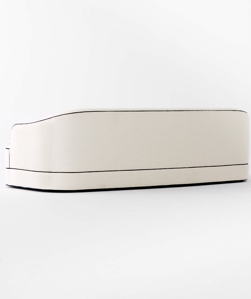 THE ONE × Mylene — Black and White Boucle Curved Sofa by goop