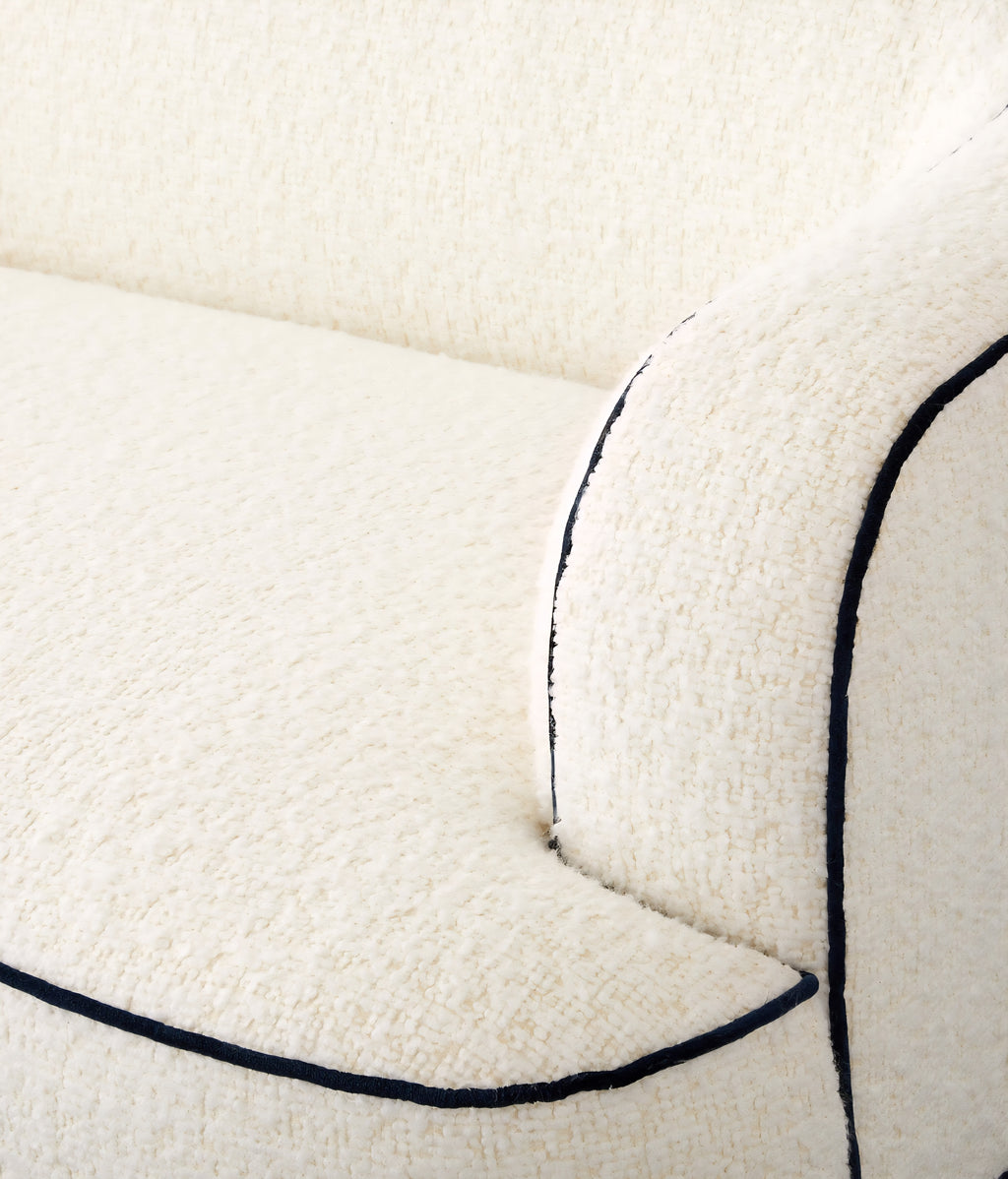 THE ONE × Mylene — Black and White Boucle Curved Sofa by goop