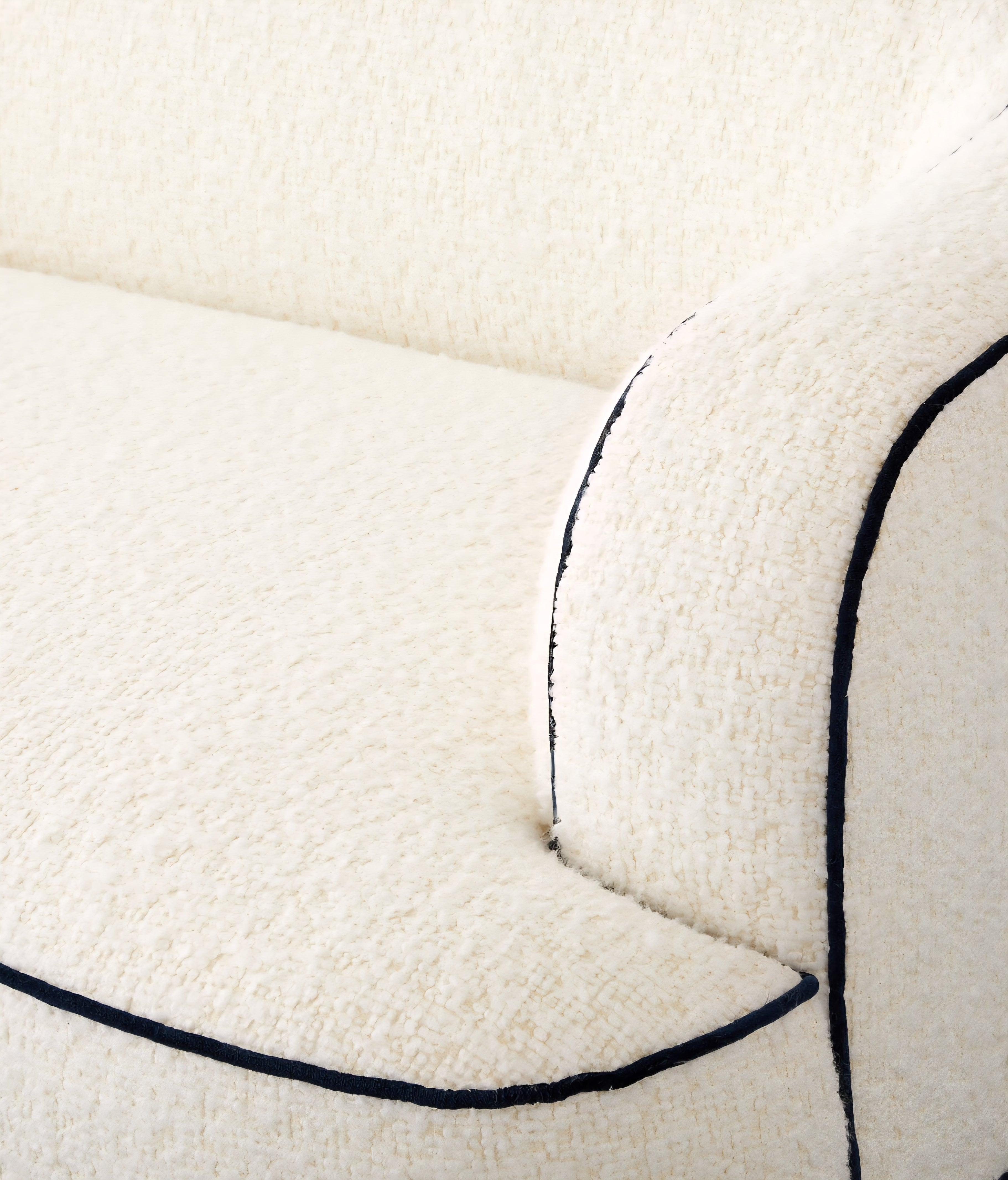 THE ONE × Mylene — Black and White Boucle Curved Sofa by goop