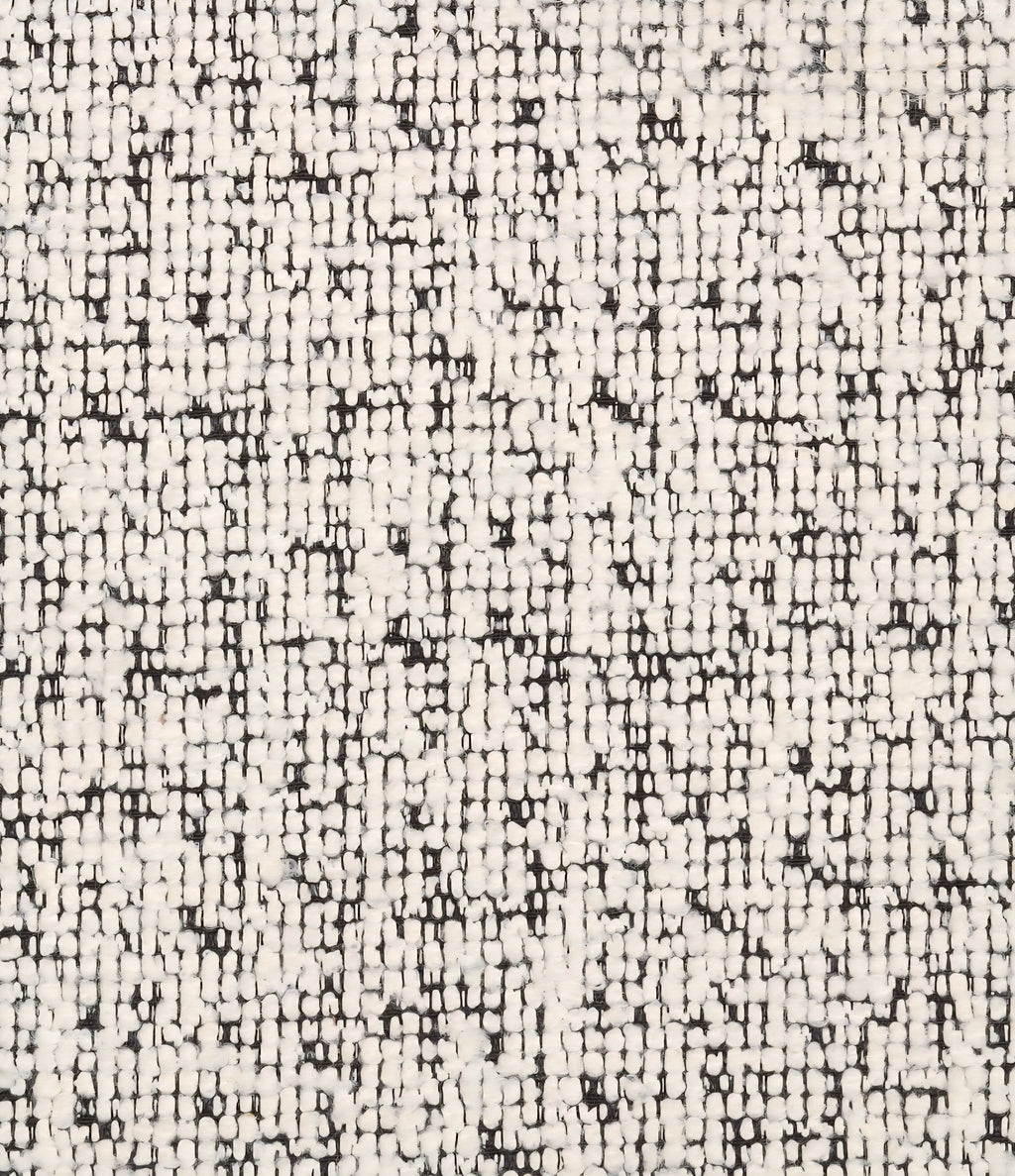THE ONE × Mylene — Black and White Boucle Curved Sofa by goop