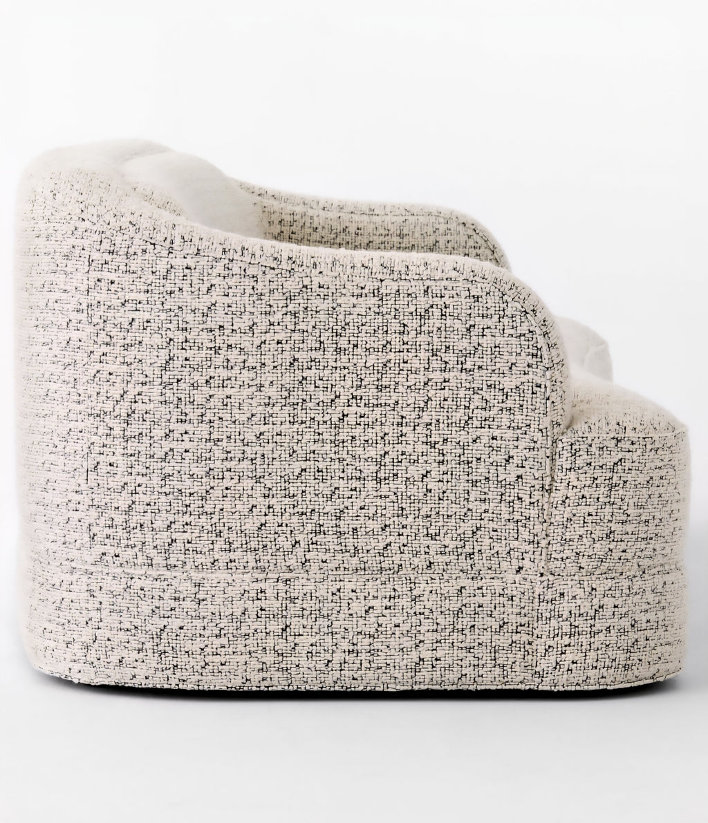 THE ONE × Mylene — Black and White Boucle Curved Sofa by goop