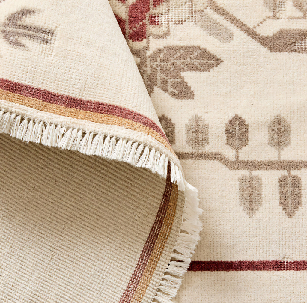 THE ONE × Fiora — Hand-Knotted Distressed Warm White New Zealand Wool Area Rug